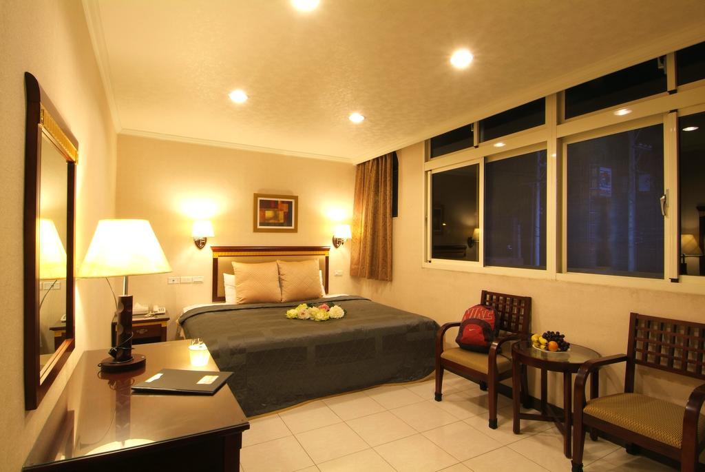 Puti Commercial Hotel Longtan Bagian luar foto
