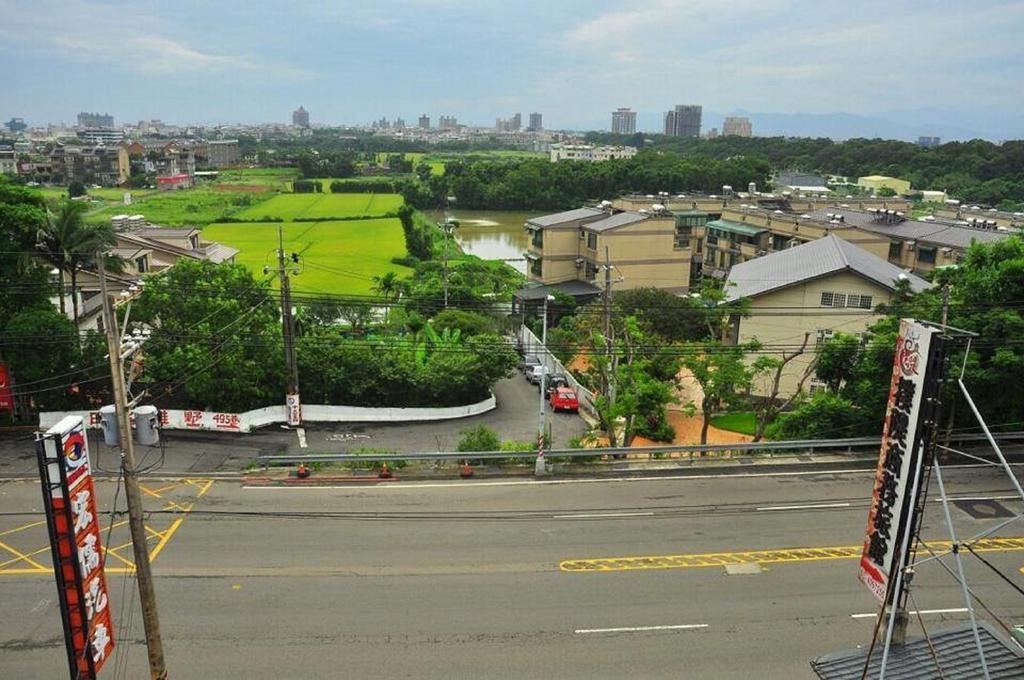 Puti Commercial Hotel Longtan Bagian luar foto