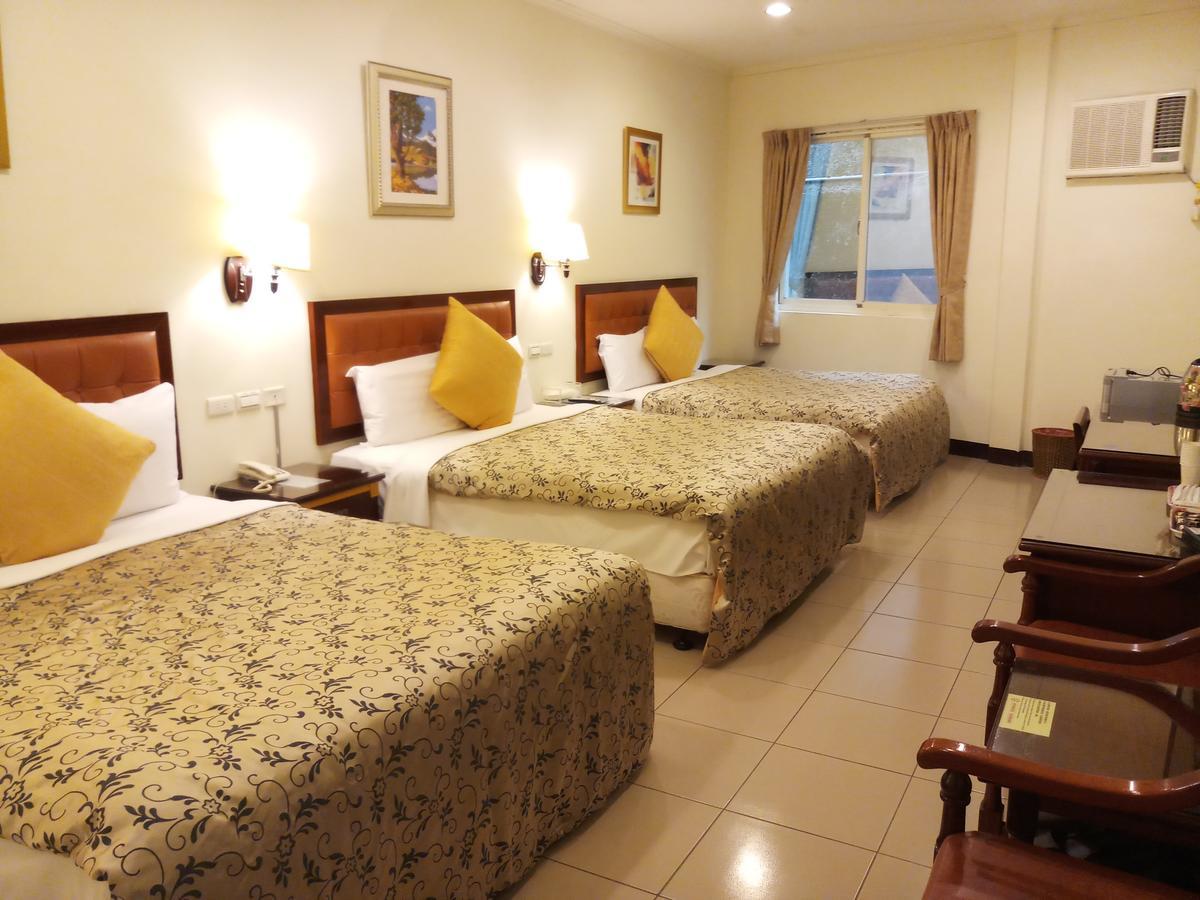 Puti Commercial Hotel Longtan Bagian luar foto