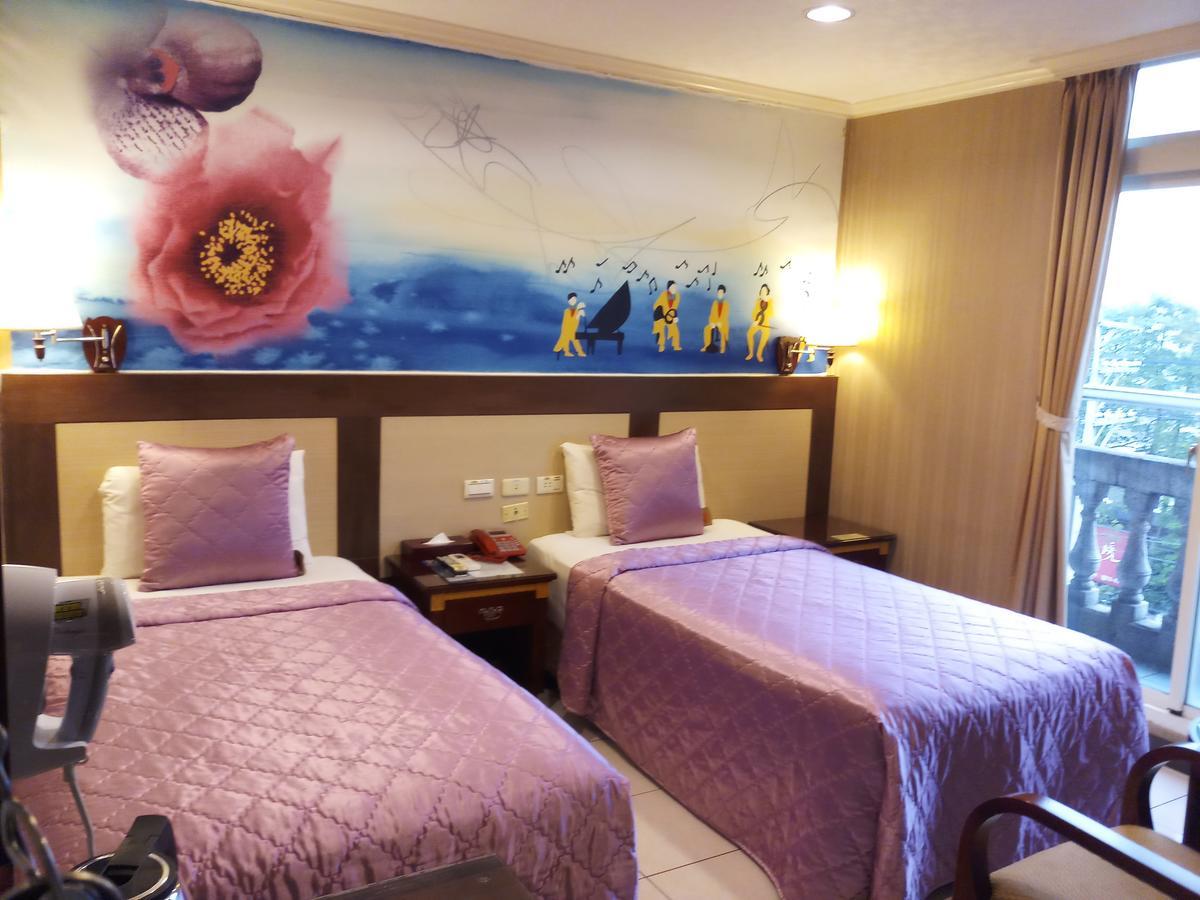 Puti Commercial Hotel Longtan Bagian luar foto