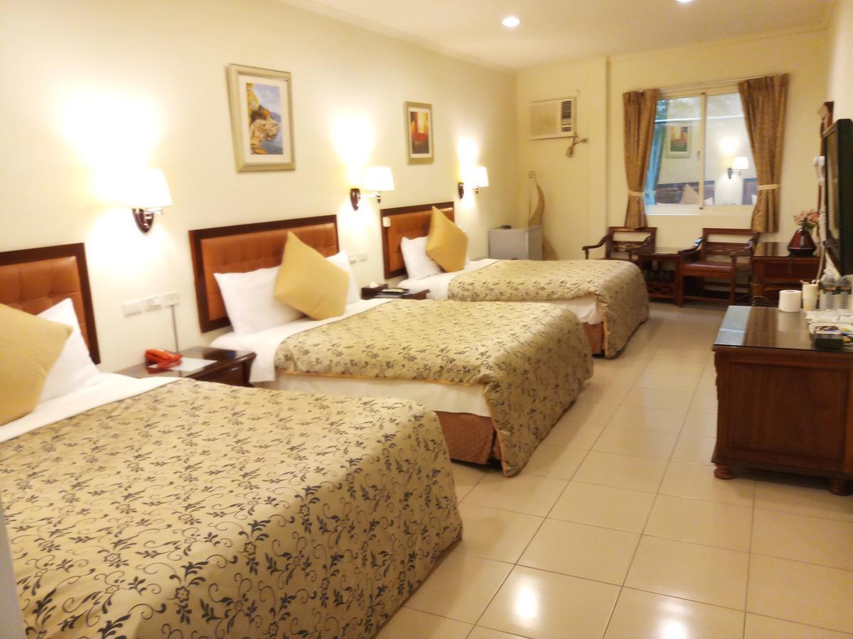 Puti Commercial Hotel Longtan Bagian luar foto